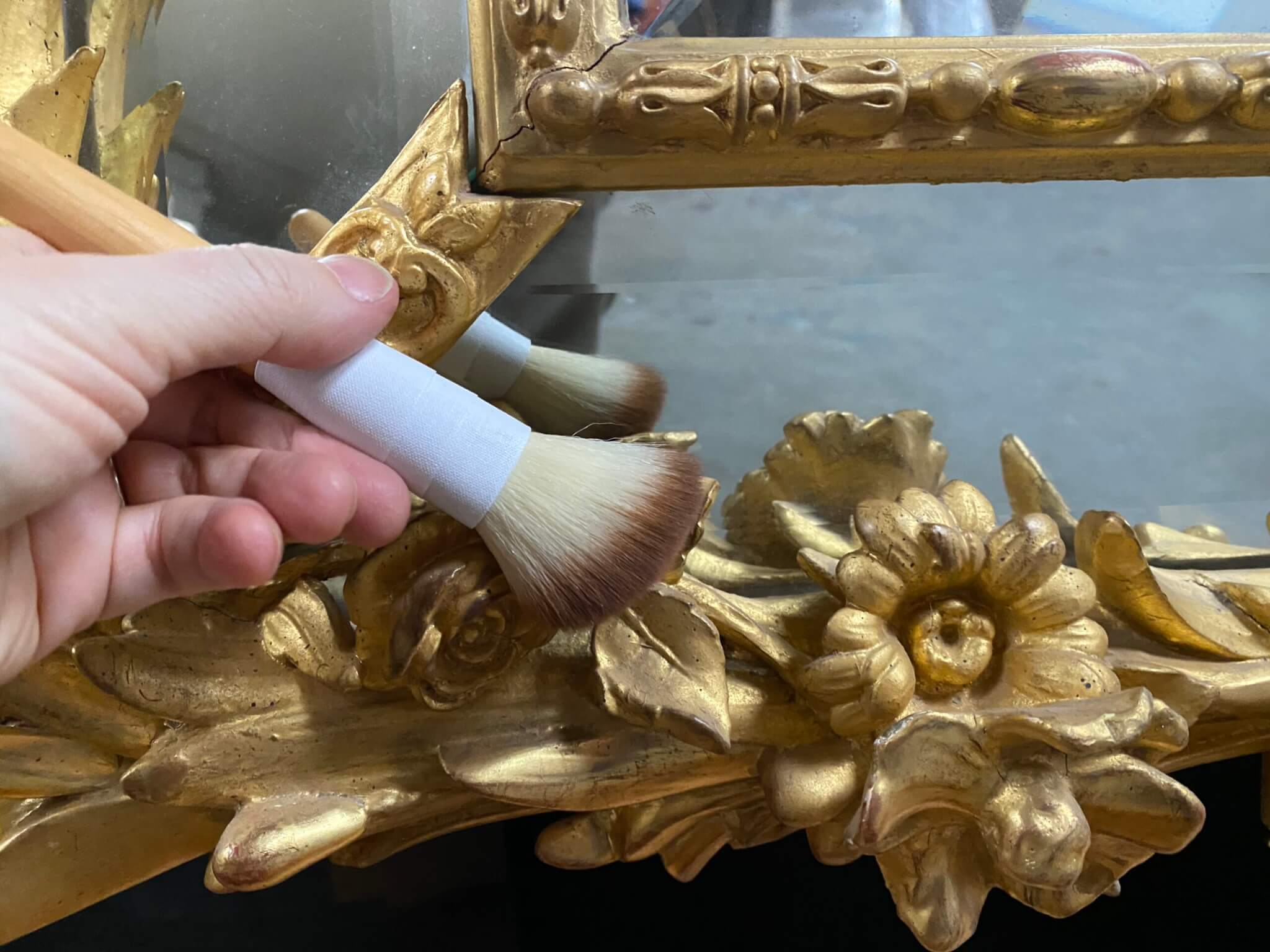 light dusting of antique gilded frame. Gilded frame. antique frame conservation. Frame repair. Picture frame repair.