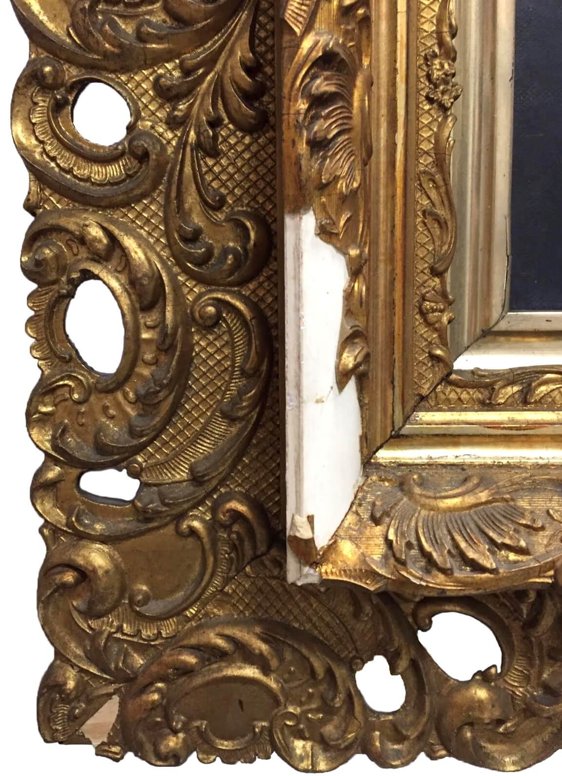 detail of a damaged frame corner. Antique frame restoration. picture frame repair.  The losses can be carved, or cast and then gilded in the repair. Frame restoration chicago