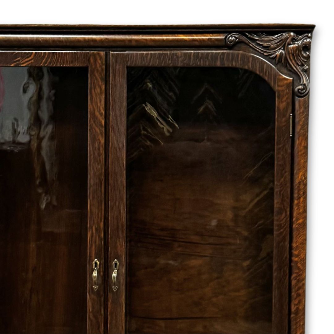 the treated china cabinet with a replacement antique glass panel and the waxed revived wooden surface