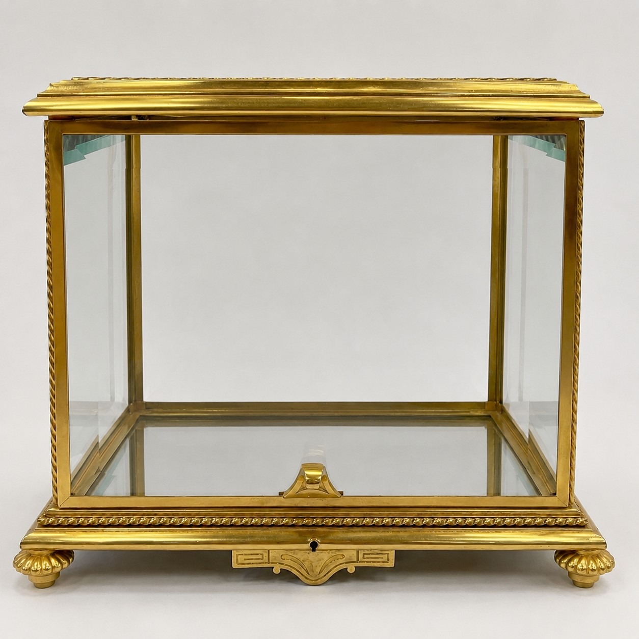 Antique brass tantalus with replacement beveled glass panel, direct front view after restoration