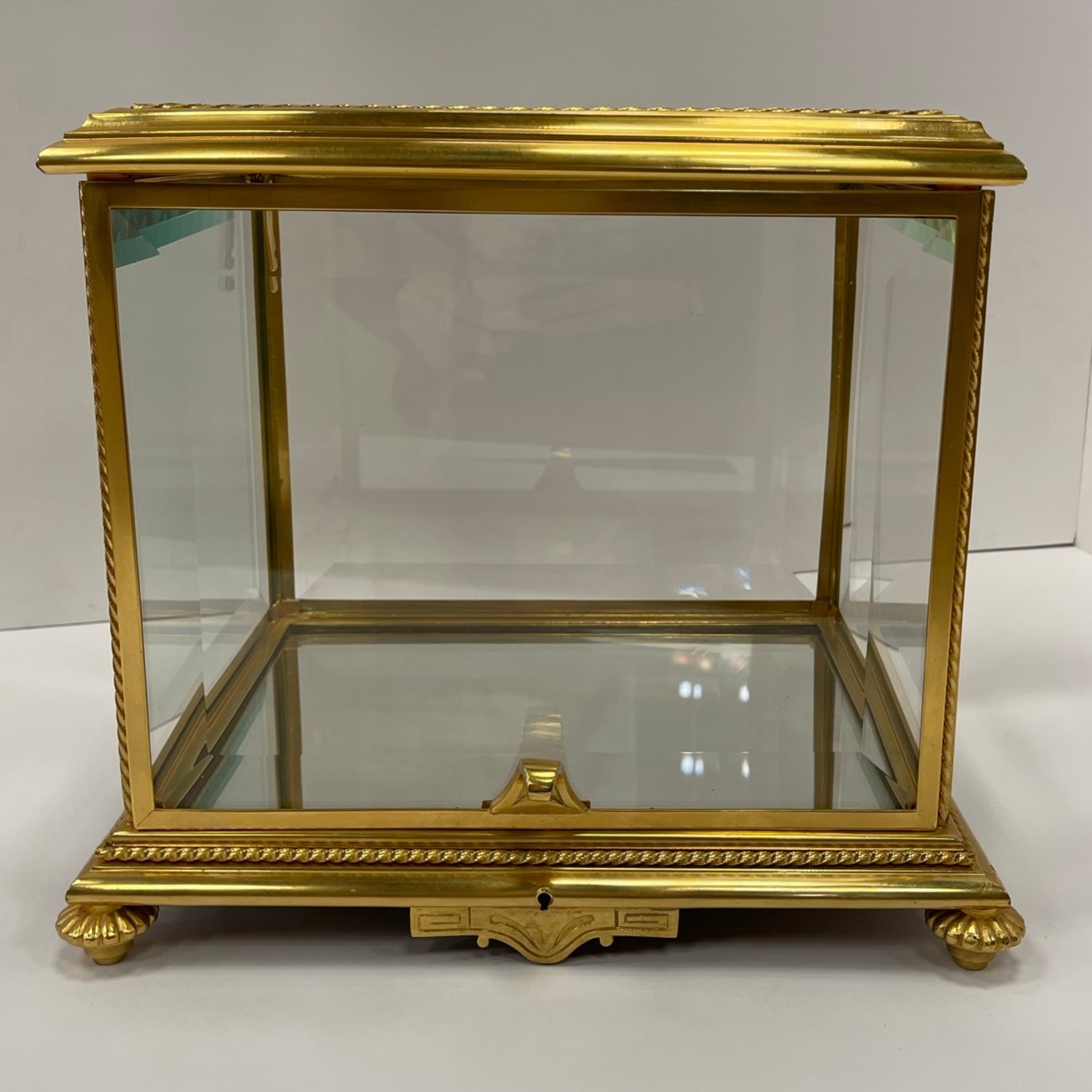 Antique brass tantalus with replacement beveled glass panel, front view after restoration