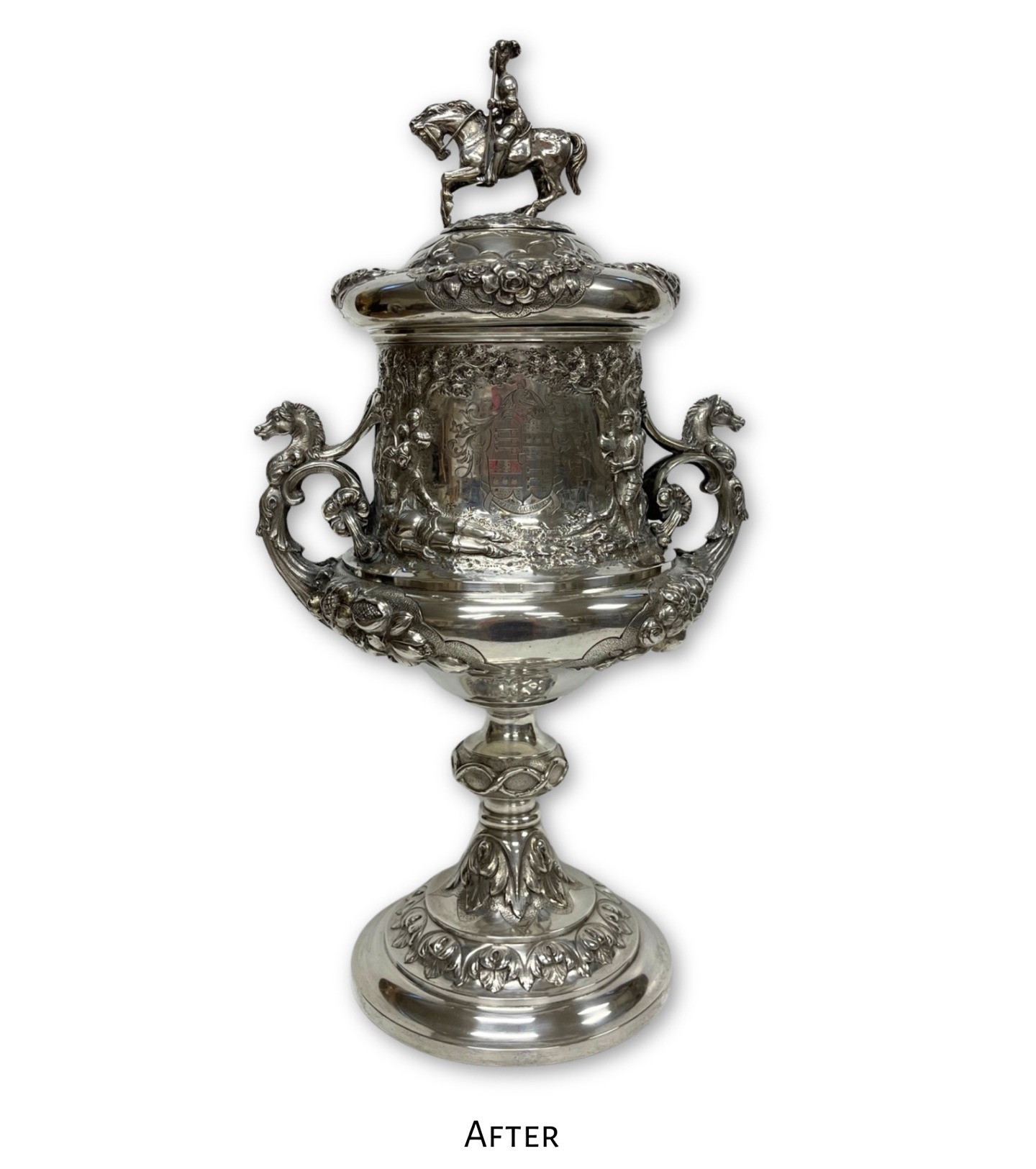 AFTER: Antique silver trophy cup restored to a clean, historically co nsistent sheen after fire and soot damage treatment